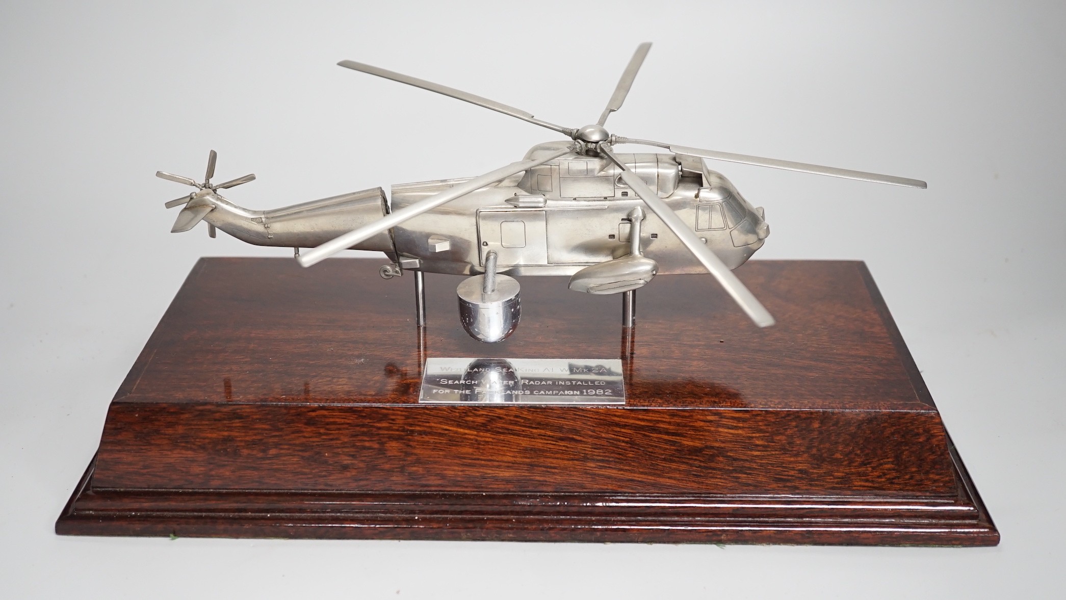 A model of a Sea King helicopter by Brian Banbury, with original case, Helicopter stand 34cm long